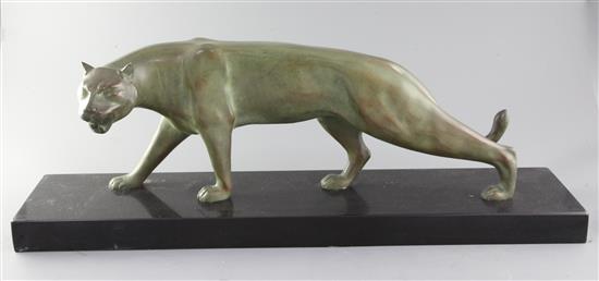 J. Brault. An Art Deco green patinated bronze model of a panther, width 27.5in.